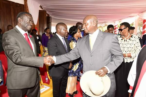 President Museveni greets Dr. Kiiza Besigye