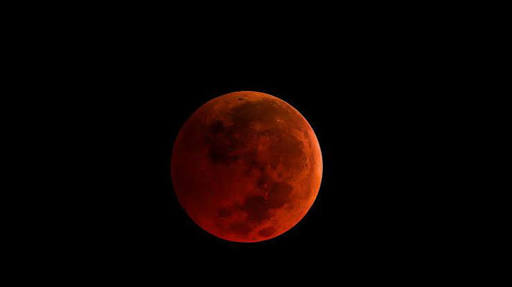Who will preside over the lunar eclipse on Friday in Uganda?