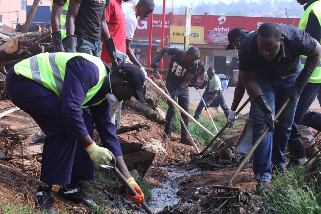 Phaneroo Cleans Kasubi Market and Trenches to improve Sanitation of the area