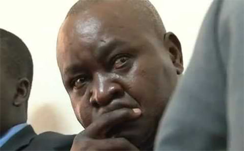 Former Vice President Gilbert Bukenya sheds tears as he talks about his fallen son in an interview